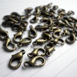 25x 10mm Antique Gold Plated Trigger Clasps